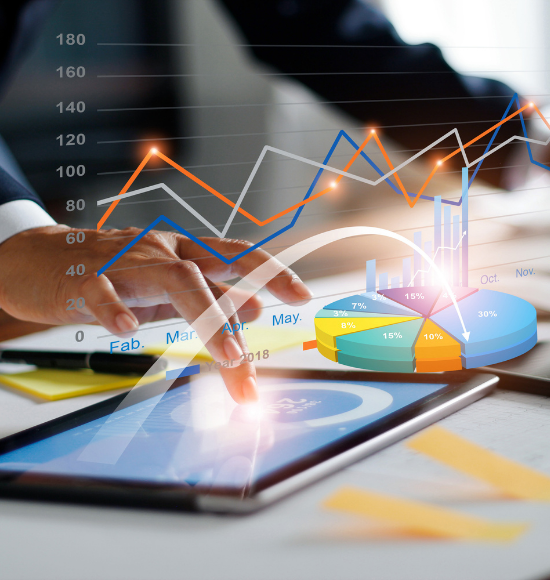 Man using tablet with graphs displayed