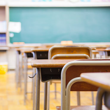 Desks lined up in a classroom